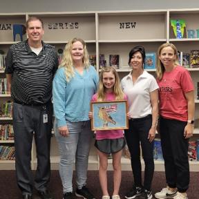 Concordia Fall Fest 4th Grade Button Contest Winner Taytum Mugler pictured with Elementary School Principal Derek Holmes, Kindra Hollen with the Concordia Chamber of Commerce Board of Directors, Art Teacher Shawn Hood and Elementary School Assistant Principal Krystal Breese