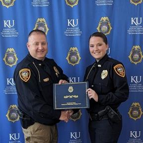 Concordia Police Chief Brent Gering Congratulates Emma Thyfault on Graduating Basic Training Class at the Kansas Law Enforcement Training Center